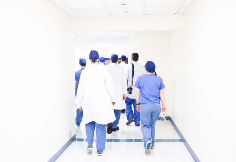 Medical staff walking down a hospital corridor